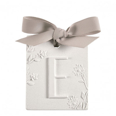 Scented detail Initial with bow