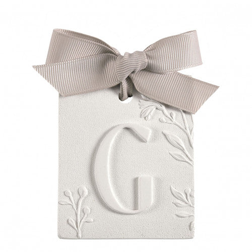 Scented detail Initial with bow