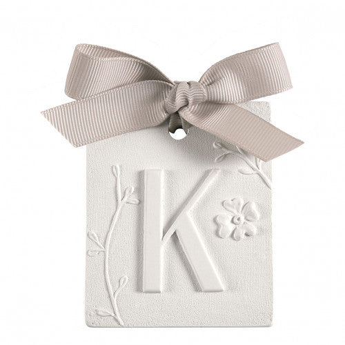 Scented detail Initial with bow