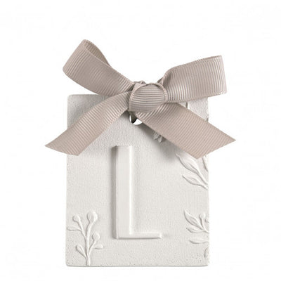 Scented detail Initial with bow