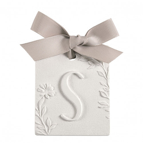 Scented detail Initial with bow