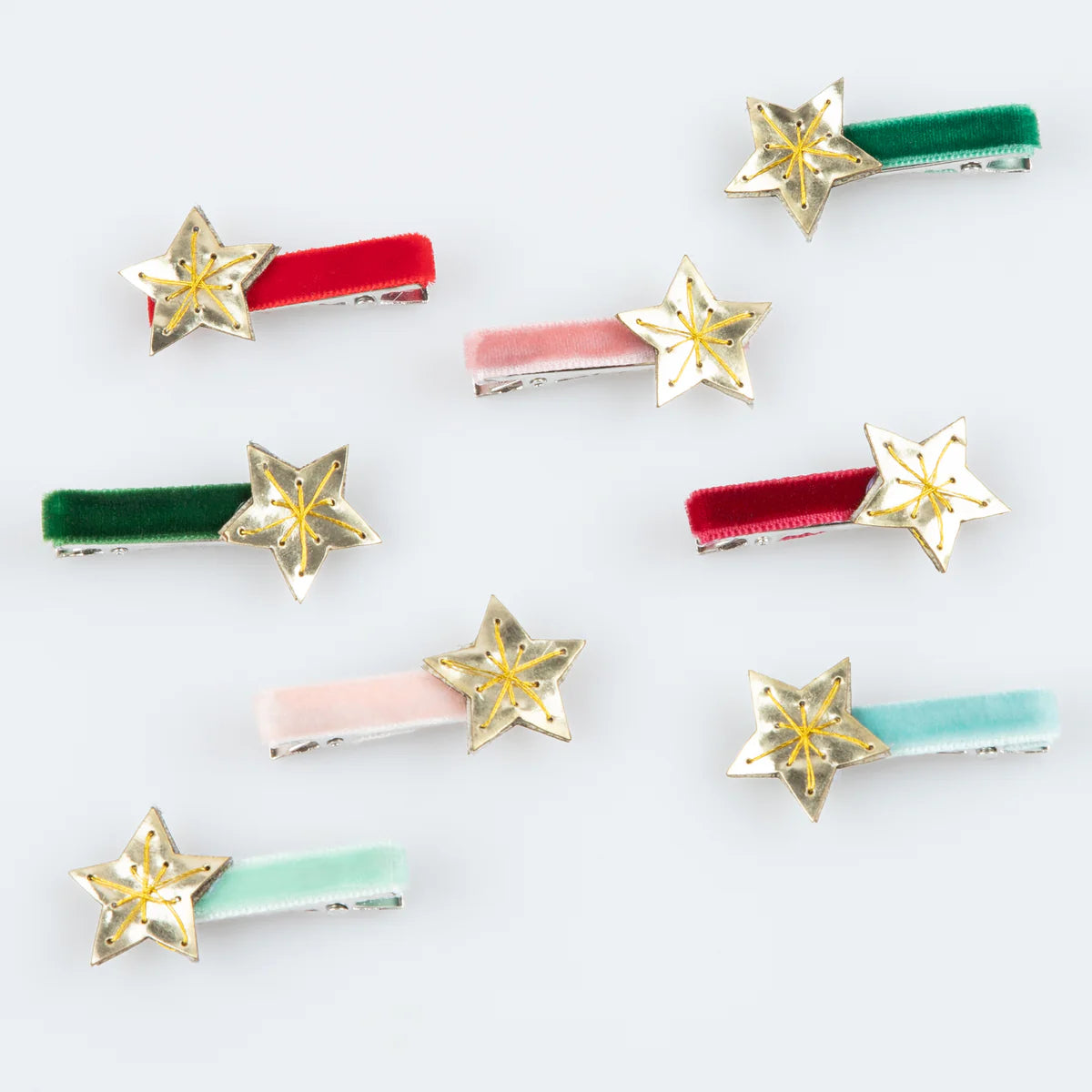 Pack clips terciopelo multicolor con estrella dorada / 8 uds.