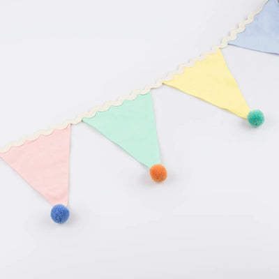 Multicolored fabric bunting garland with pom pom
