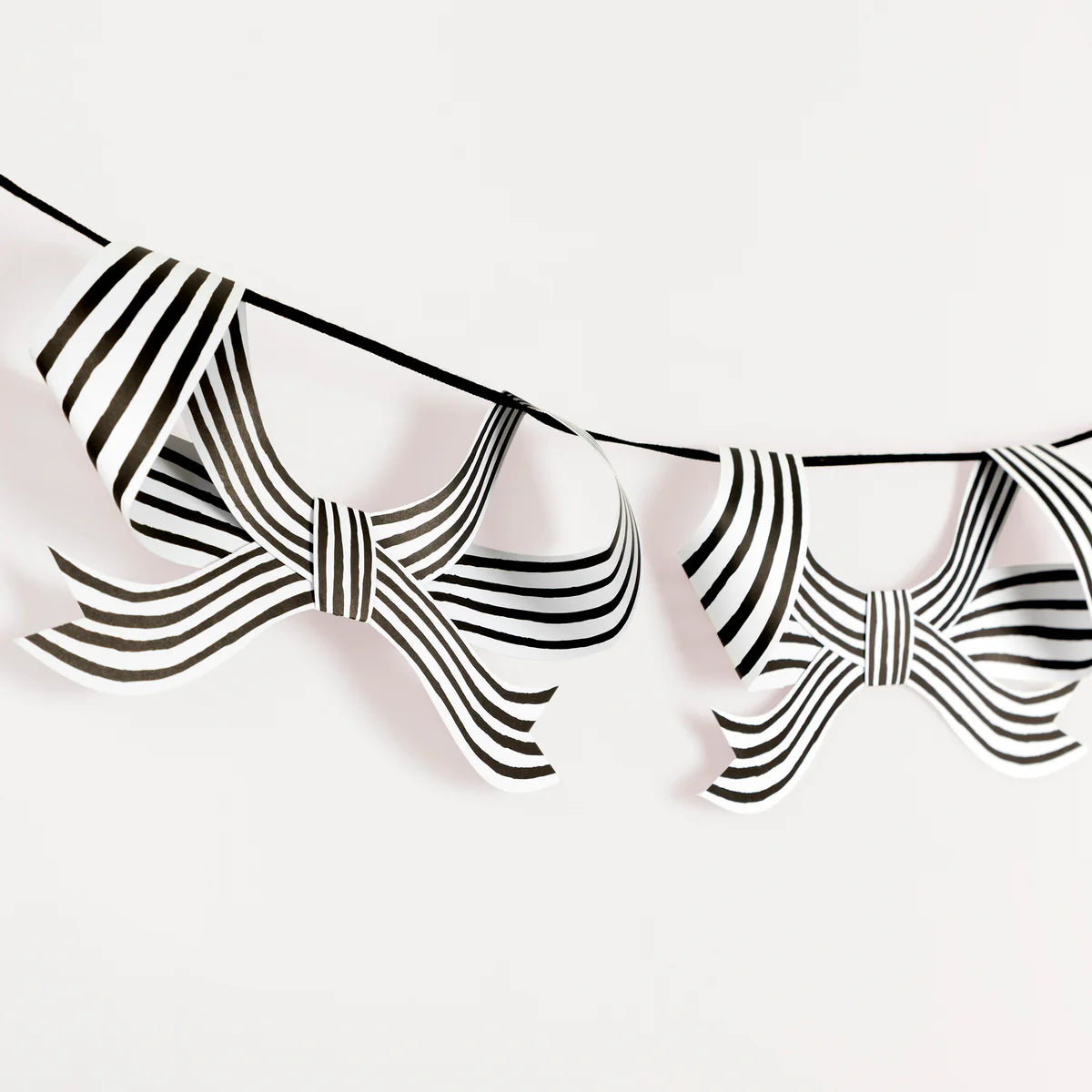 Garlands of black and white ribbons