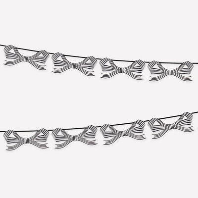 Garlands of black and white ribbons