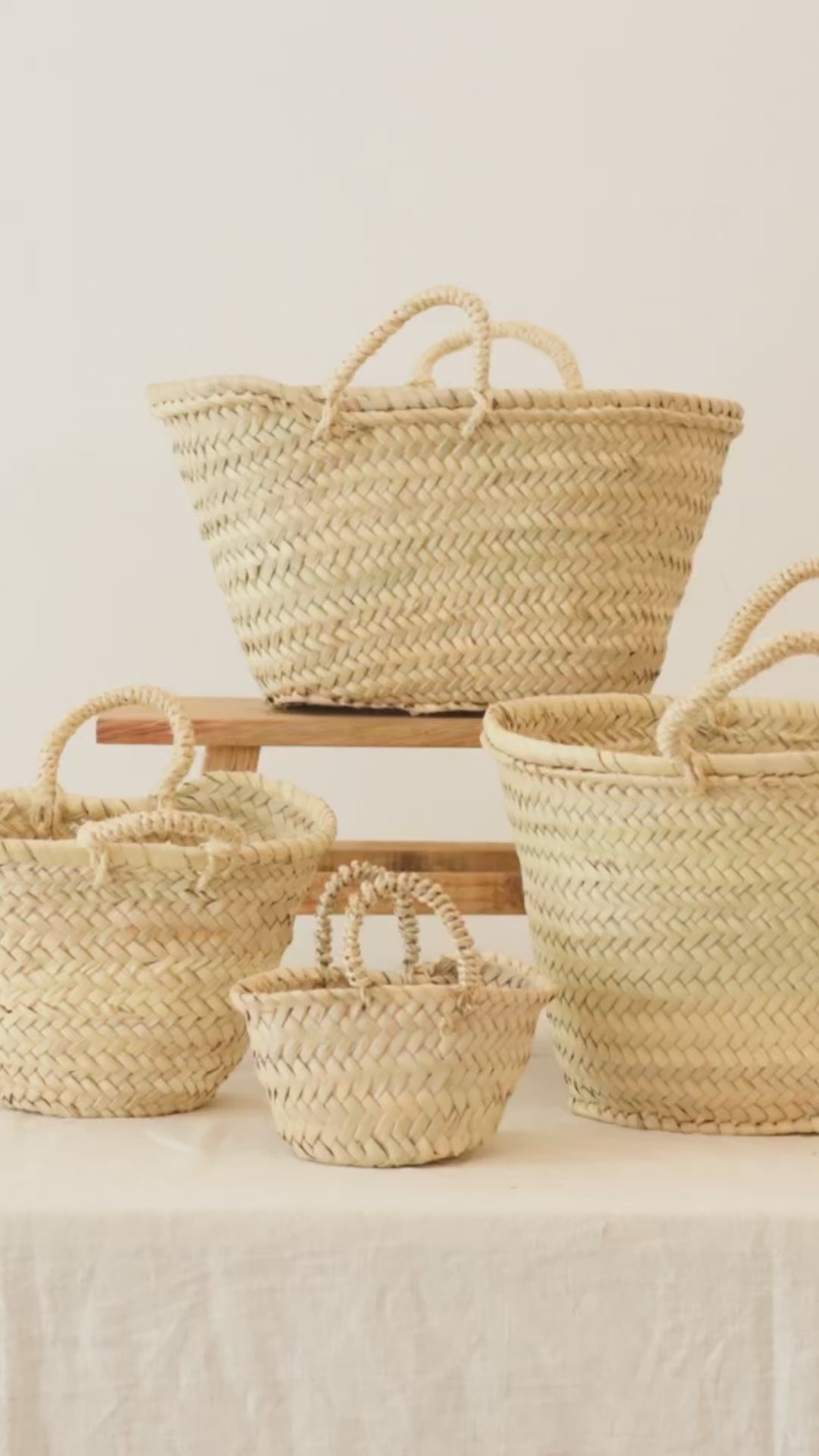 High hand-woven raffia tote