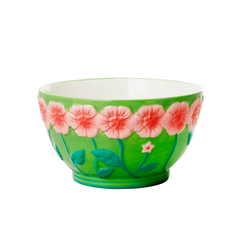 Tigela de cerâmica verde com flores
