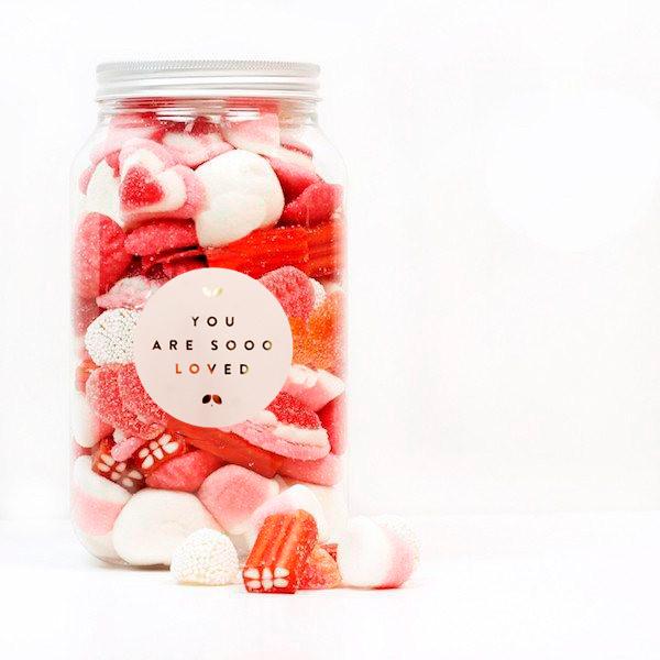 Bouquet red heart balloons swollen jar of sweets