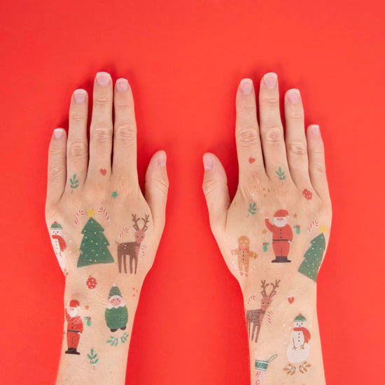 Tatuagem temporária com motivos de Natal