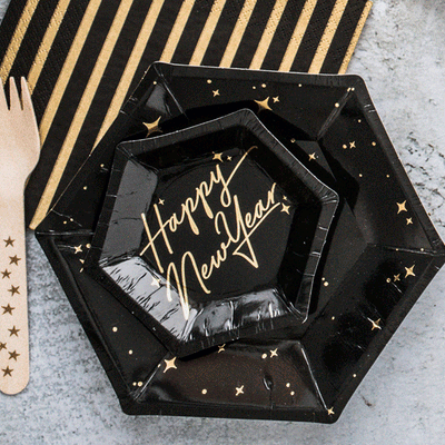 Plato hexagonal negro con estrellas doradas / 6 uds.